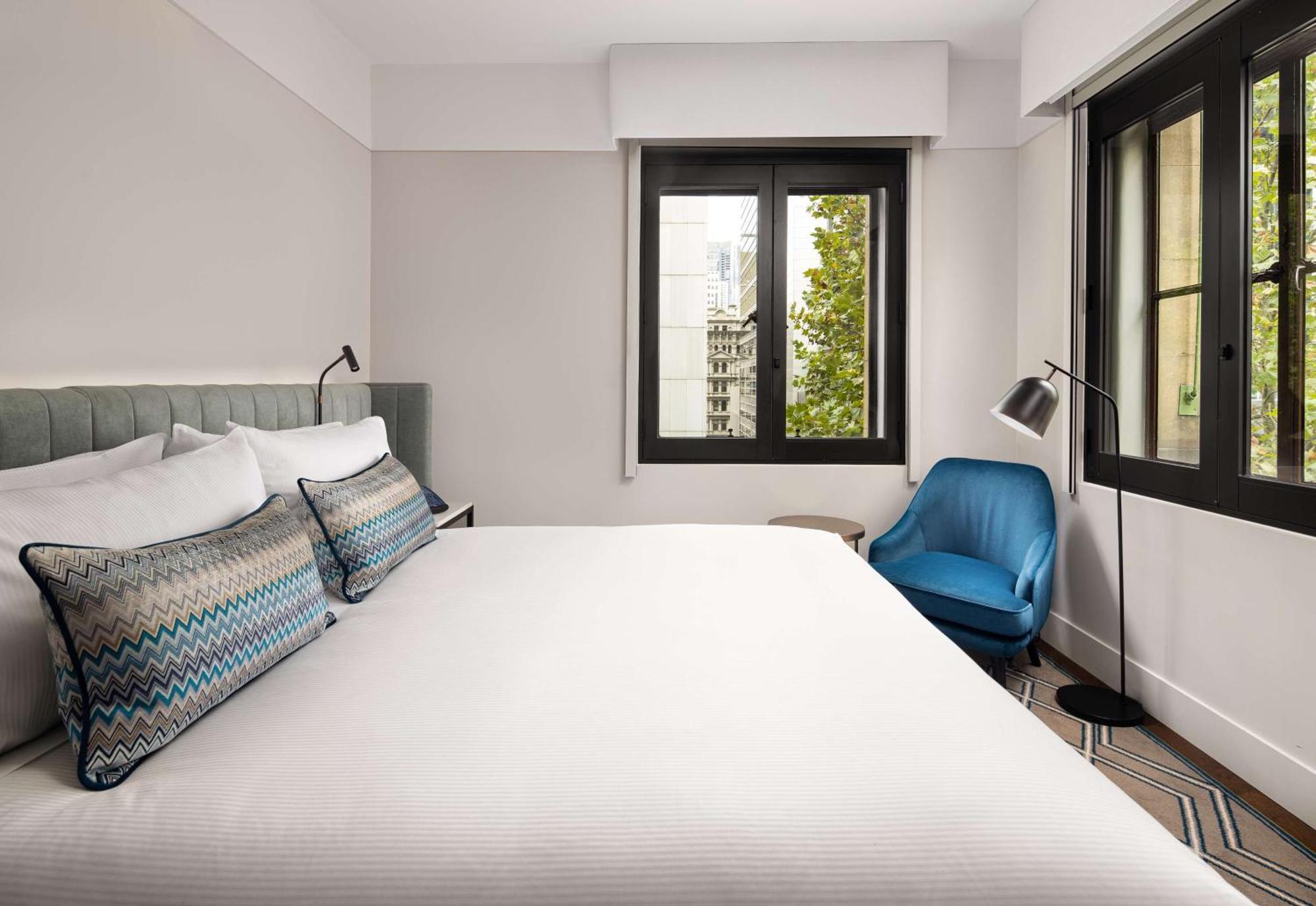 ホテル ヒルトン メルボルン リトル クイーン ストリート エクステリア 写真 A bedroom at the hotel