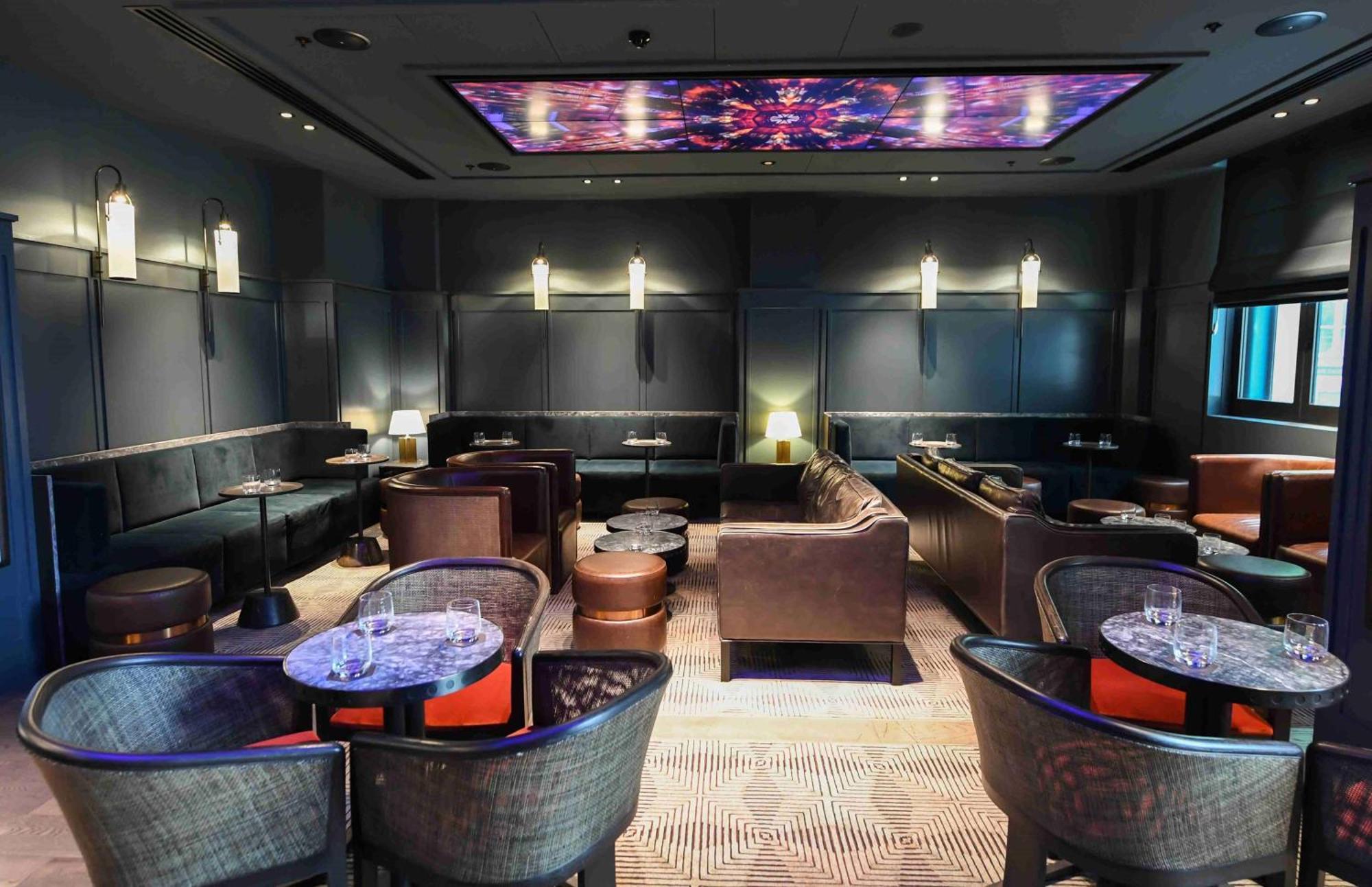 ホテル ヒルトン メルボルン リトル クイーン ストリート エクステリア 写真 The interior of the lounge
